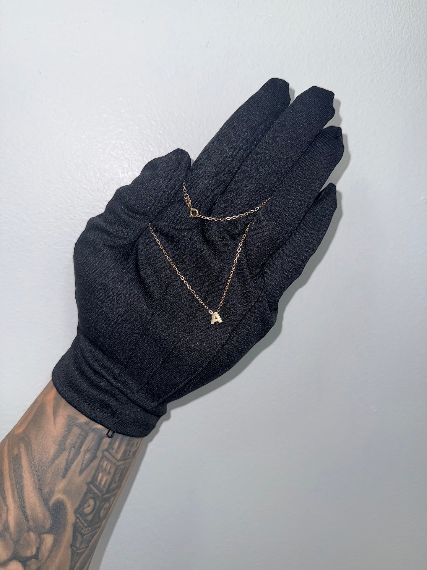Cadena de aro con letra